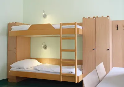 Ein Bett oder Betten in einem Zimmer der Unterkunft Jugendherberge Wien - Myrthengasse