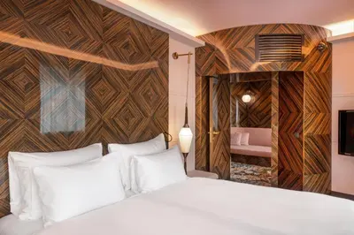 Ein Bett oder Betten in einem Zimmer der Unterkunft Hotel Topazz & Lamée