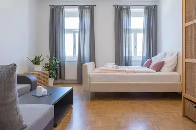 Ein Bett oder Betten in einem Zimmer der Unterkunft Kingsize Central Station Residence