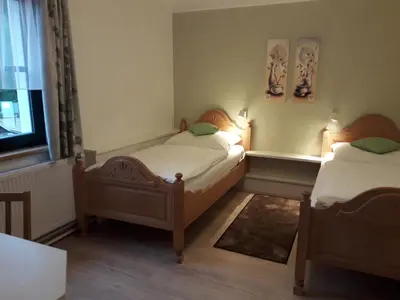 Ein Bett oder Betten in einem Zimmer der Unterkunft Pension Hendling