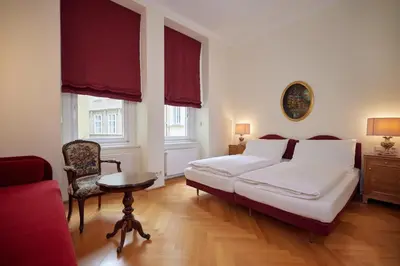 Ein Bett oder Betten in einem Zimmer der Unterkunft Hotel Regina