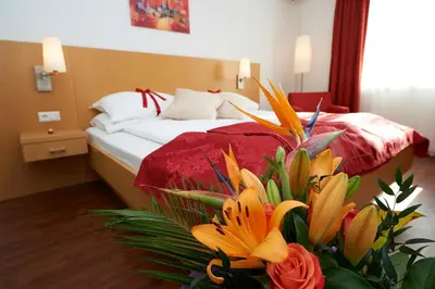 Ein Bett oder Betten in einem Zimmer der Unterkunft City-Hotel Mödling