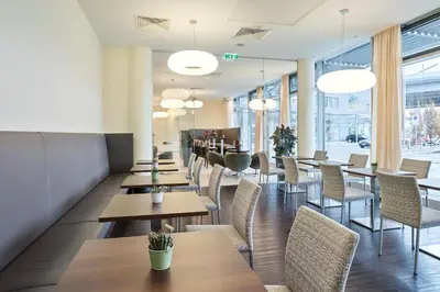 Ein Restaurant oder anderes Speiselokal in der Unterkunft Austria Trend Hotel Doppio Wien