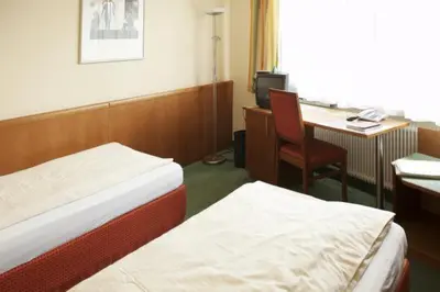 Ein Bett oder Betten in einem Zimmer der Unterkunft Landgasthof Hotel Muhr