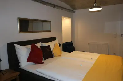 Ein Bett oder Betten in einem Zimmer der Unterkunft Schottenring City Stock Exchange Apartments