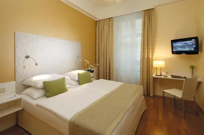 Ein Bett oder Betten in einem Zimmer der Unterkunft Hotel Wandl