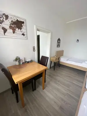 Ein Bett oder Betten in einem Zimmer der Unterkunft Pension Lizzi