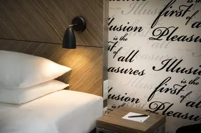 Ein Bett oder Betten in einem Zimmer der Unterkunft elaya hotel vienna city west, Trademark by Wyndham