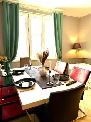 Ein Sitzbereich in der Unterkunft Center Apartment with 360° Rooftop