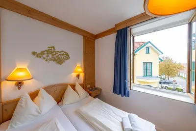 Ein Bett oder Betten in einem Zimmer der Unterkunft Hotel Krug