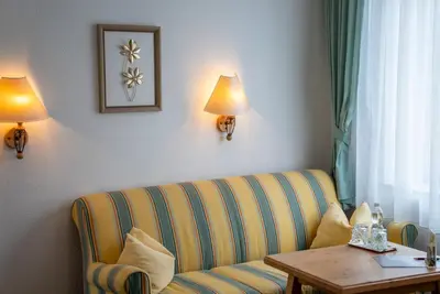 Ein Sitzbereich in der Unterkunft Hotel Krug