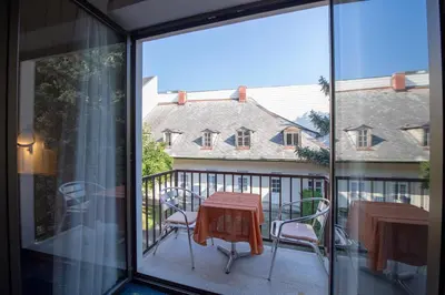 Ein Balkon oder eine Terrasse in der Unterkunft Pension Wienerstub'n