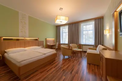 Ein Bett oder Betten in einem Zimmer der Unterkunft Pension Wienerstub'n