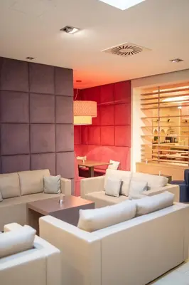 Ein Sitzbereich in der Unterkunft Hotel Orangerie