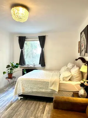 Ein Bett oder Betten in einem Zimmer der Unterkunft Central &cozy