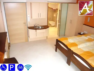 Ein Bett oder Betten in einem Zimmer der Unterkunft abcd-apartments 23 Nielrosenweg