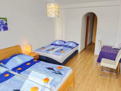 Ein Bett oder Betten in einem Zimmer der Unterkunft Frühstückspension See-Panorama