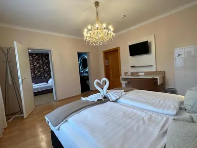 Ein Bett oder Betten in einem Zimmer der Unterkunft Pension Amelie