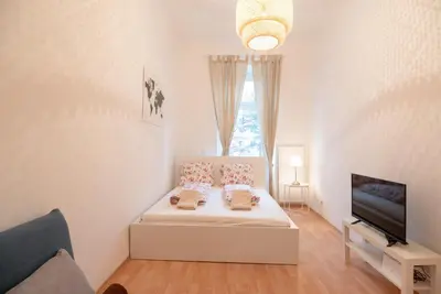 Ein Bett oder Betten in einem Zimmer der Unterkunft Vienna City Apartment Schnirchgasse
