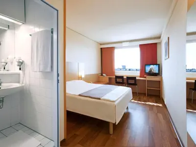 Ein Bett oder Betten in einem Zimmer der Unterkunft Ibis Wien Messe