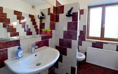 Ein Badezimmer in der Unterkunft House With Courtyard & Parking Close To Stadtpark