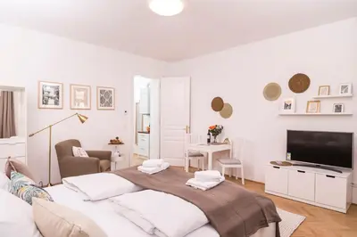 Ein Bett oder Betten in einem Zimmer der Unterkunft Heart of Ottakring