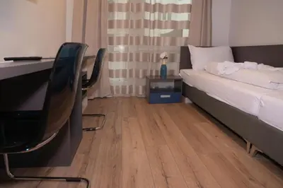 Ein Bett oder Betten in einem Zimmer der Unterkunft Mariahilf Suites