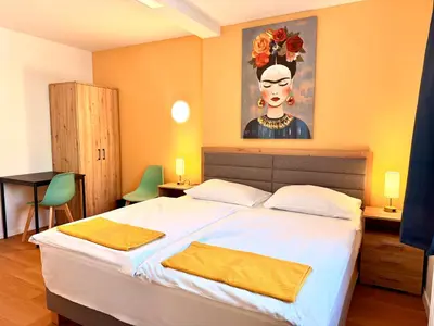 Ein Bett oder Betten in einem Zimmer der Unterkunft A&T Hotel & Hostel