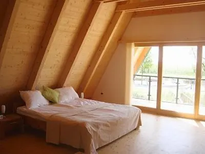 Ein Bett oder Betten in einem Zimmer der Unterkunft Ferienhäuser Finiki