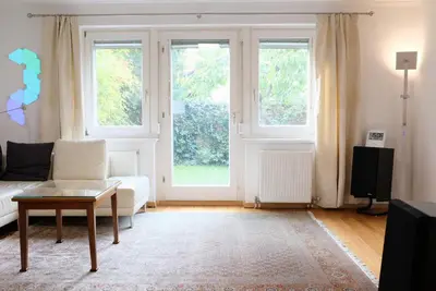 Ein Sitzbereich in der Unterkunft Town House near Metro & Vienna City Center