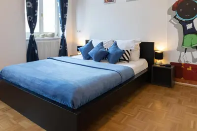 Ein Bett oder Betten in einem Zimmer der Unterkunft Yeshello Apartment near Central Station
