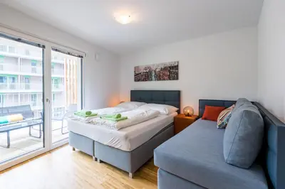 Ein Bett oder Betten in einem Zimmer der Unterkunft FeelGood Apartments GreenLiving | contactless check-in