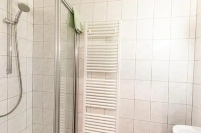 Ein Badezimmer in der Unterkunft Hotel-Pension Fünfhaus