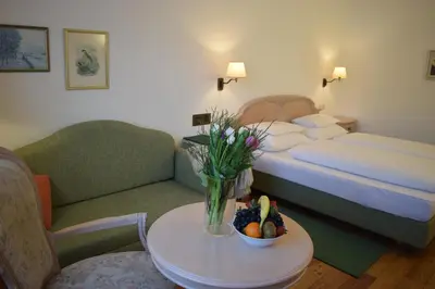 Ein Bett oder Betten in einem Zimmer der Unterkunft Hotel Landhaus Fuhrgassl-Huber