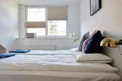 Ein Bett oder Betten in einem Zimmer der Unterkunft Vienna Experience