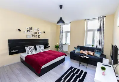 Ein Bett oder Betten in einem Zimmer der Unterkunft Radiant Premium Apartments - Fünfhaus