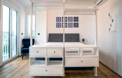 Ein Bett oder Betten in einem Zimmer der Unterkunft SPA Boutique Appartement # 26 with Indoor- and Outdoorpool
