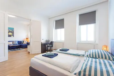 Ein Bett oder Betten in einem Zimmer der Unterkunft Lodge in Style Vienna - Austria Campus