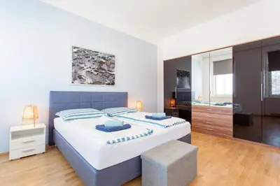 Ein Bett oder Betten in einem Zimmer der Unterkunft Lodge in Style Vienna - Austria Campus