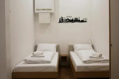 Ein Bett oder Betten in einem Zimmer der Unterkunft Vienna Gold Apartments - contactless check in