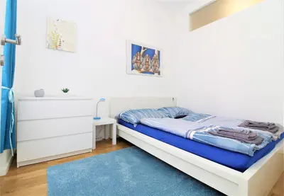 Ein Bett oder Betten in einem Zimmer der Unterkunft Modern Apartment with Underfloor Heating