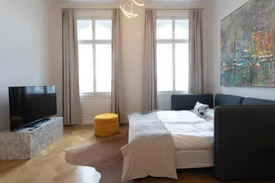 Ein Bett oder Betten in einem Zimmer der Unterkunft BOUTIQUE RESIDENCES at GAUDENZDORFER