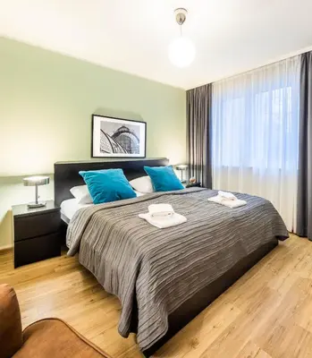 Ein Bett oder Betten in einem Zimmer der Unterkunft Jimmy's Apartments Lory