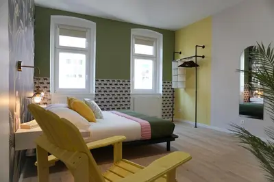 Ein Bett oder Betten in einem Zimmer der Unterkunft Large Apartments - Great for Groups - with Balcony or Terrace