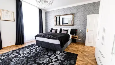 Ein Bett oder Betten in einem Zimmer der Unterkunft Sophies Place Yppenplatz - Imperial Lifestyle City Apartments Vienna Parking