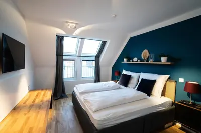 Ein Bett oder Betten in einem Zimmer der Unterkunft Boutique Design-Apartments Vienna