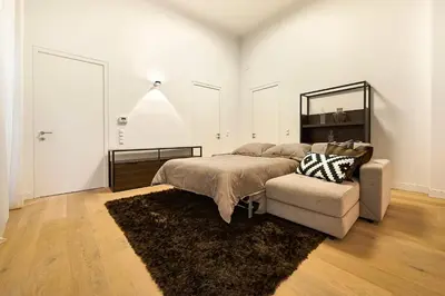 Ein Bett oder Betten in einem Zimmer der Unterkunft Central Luxury Apartment