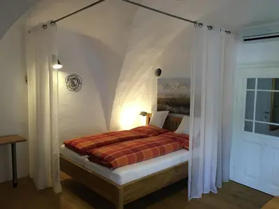 Ein Bett oder Betten in einem Zimmer der Unterkunft Ferienhaus beim Turm