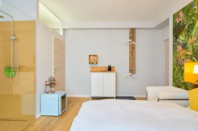 Ein Bett oder Betten in einem Zimmer der Unterkunft Leuhusen Center Apartments Vienna, Wien