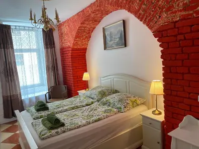 Ein Bett oder Betten in einem Zimmer der Unterkunft Viktoria ARTUR